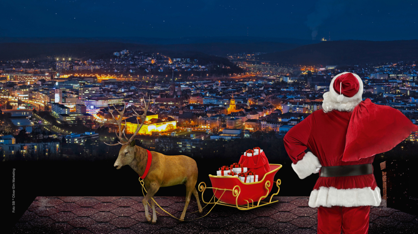 Weihnachtsmann mit Rentier